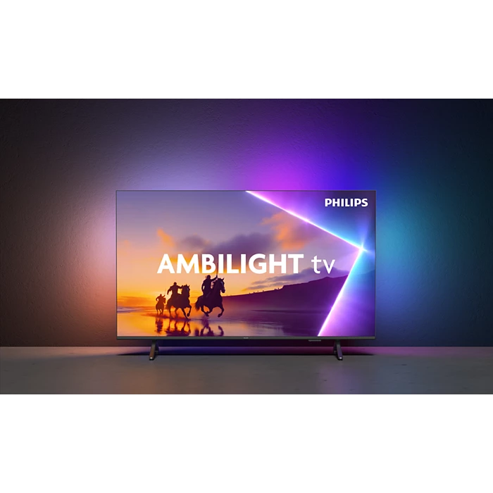 Philips QLED Ambilight smart tv met lichtpatroon op muur